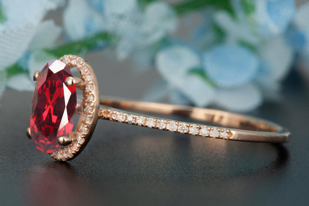 1.25 Carat Oval Cut Ruby and Diamond Engagement Ring in 9k Rose Gold Dazzling Ring