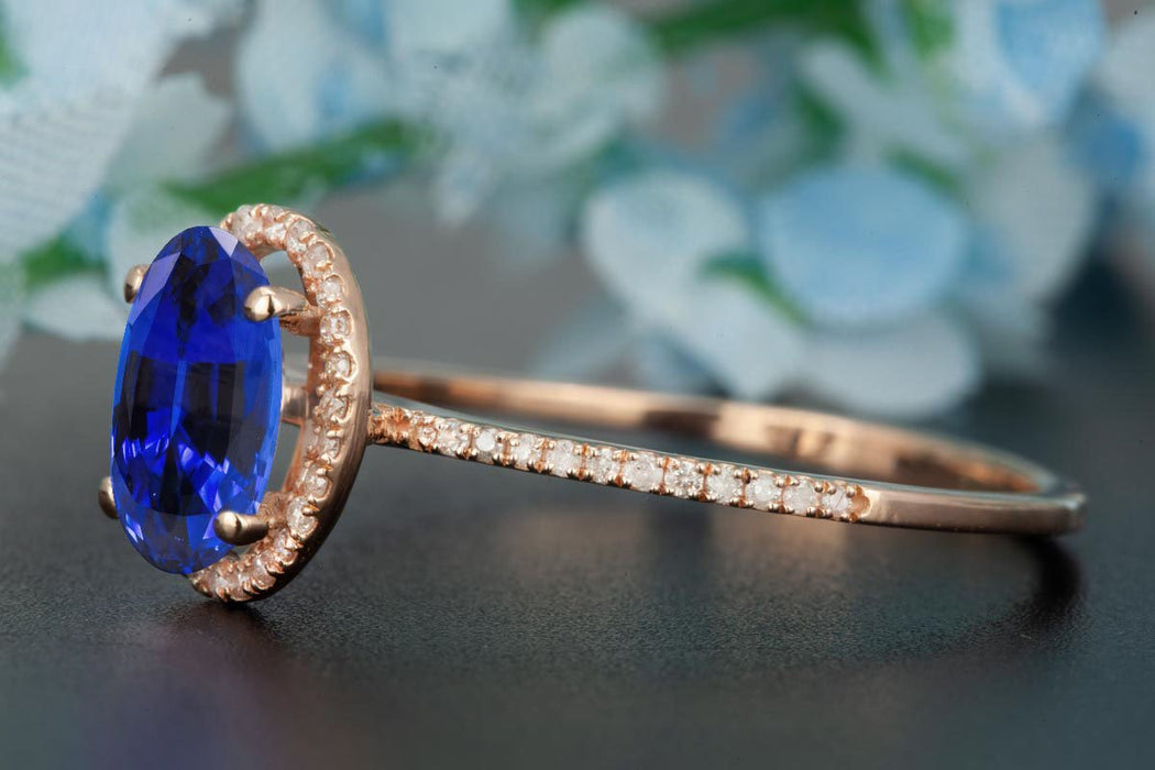 1.25 Carat Oval Cut Sapphire and Diamond Engagement Ring in Rose Gold Dazzling Ring