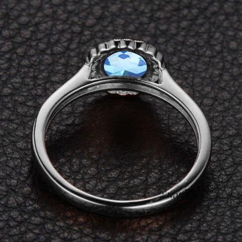 Antique 1.25 Carat Round Cut Aquamarine and Diamond Halo Engagement Ring in White Gold