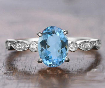 Bestselling 1.25 Carat oval cut Aquamarine and Diamond Engagement Ring in White Gold