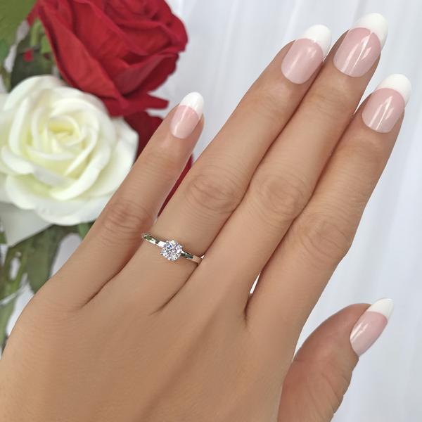 0.5 Carat Round Cut Solitair Engagement Ring in White Gold over Sterling Silver