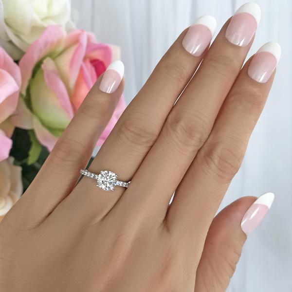 1.25 Carat Round Cut Accented Engagement Ring in White Gold over Sterling Silver