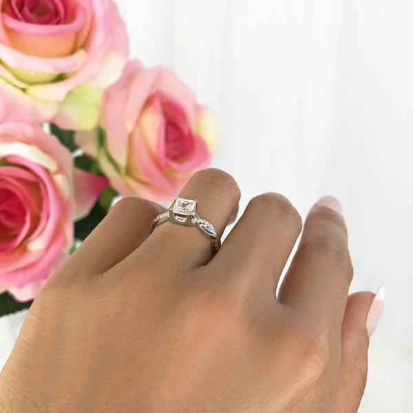 1.25 Carat Princess Cut Twisted Infinity Engagement Ring in White Gold over Sterling Silver