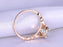 1.5 Carat Round Cut Aquamarine and Diamond Halo Engagement Ring in Rose Gold