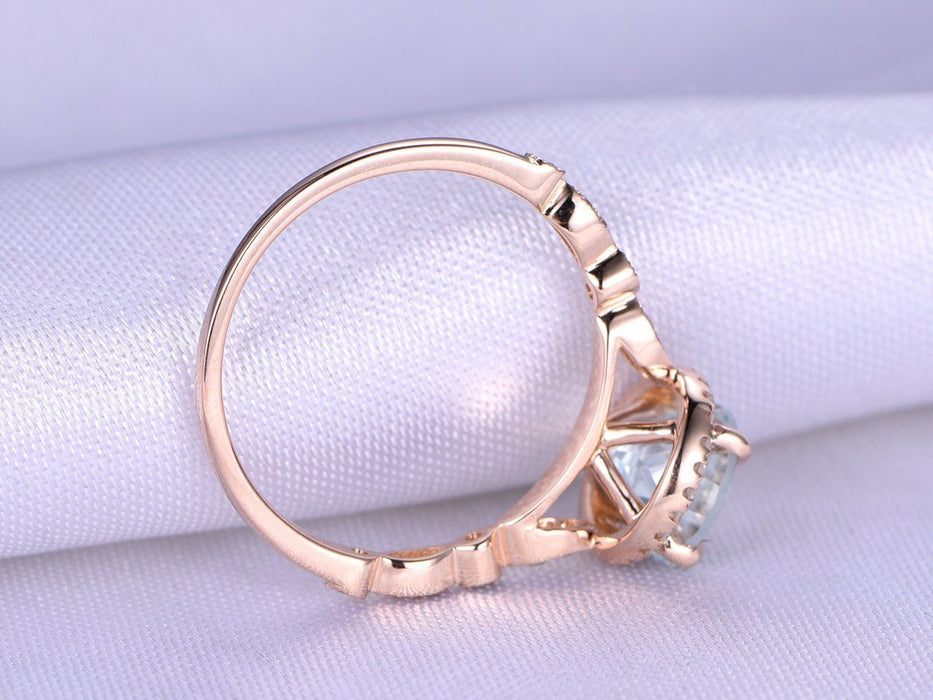 1.5 Carat Round Cut Aquamarine and Diamond Halo Engagement Ring in Rose Gold