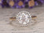 1.25 Carat Round Cut Moissanite and Diamond Halo Engagement Ring in Yellow Gold