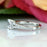 1.25 Carat Princess Cut Split Shank Engagement Ring in White Gold over Sterling Silver