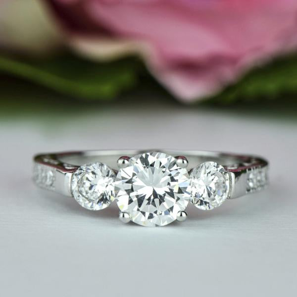Three Stones 2 Carat Round Cut Filigree Engagement Ring in White Gold over Sterling Silver