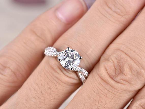 1.25 Carat Infinity Round Cut Moissanite and Diamond Engagement Ring in 9k White Gold