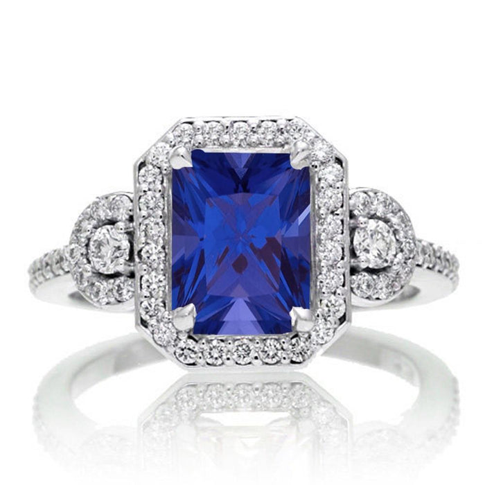 2 Carat Emerald Cut Sapphire and White Diamond Halo Engagement Ring