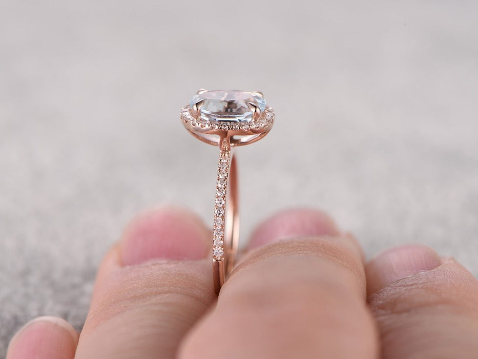 1.50 Carat oval cut Aquamarine and Diamond Engagement Ring in Rose Gold
