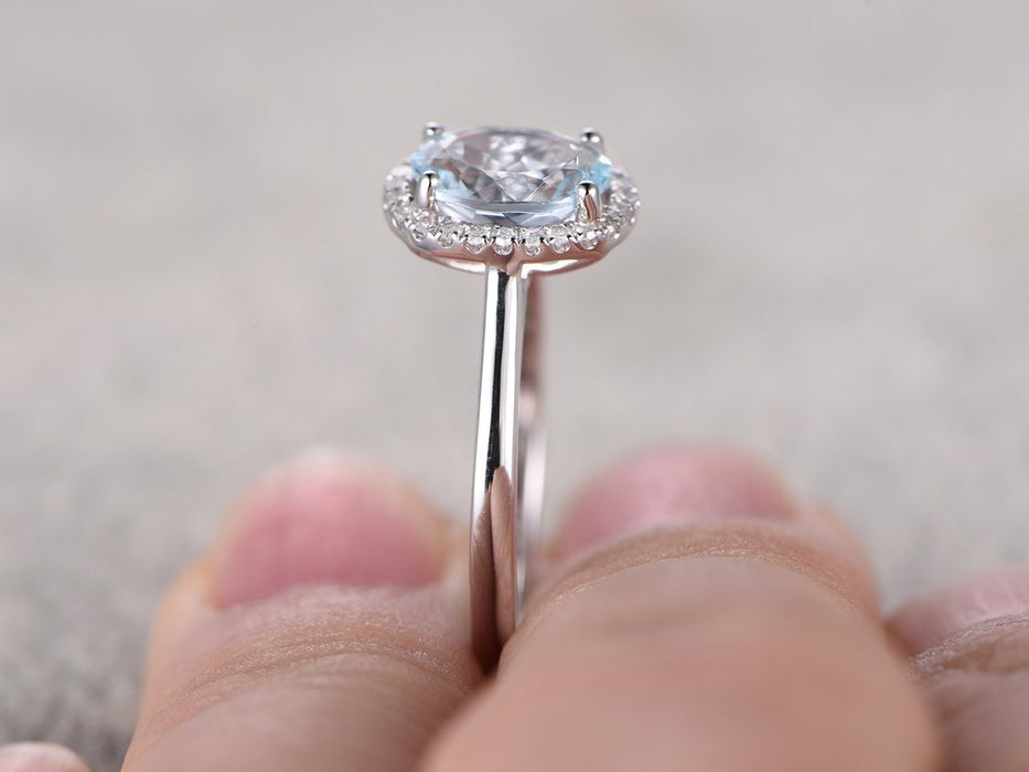 Delicate 1.25 Carat Aquamarine and Diamond Halo Engagement Ring in White Gold