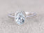 Delicate 1.25 Carat Aquamarine and Diamond Halo Engagement Ring in White Gold