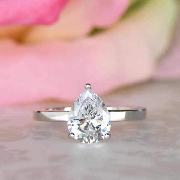 2 Carat Pear Cut Solitaire Engagement Ring in White Gold over Sterling Silver