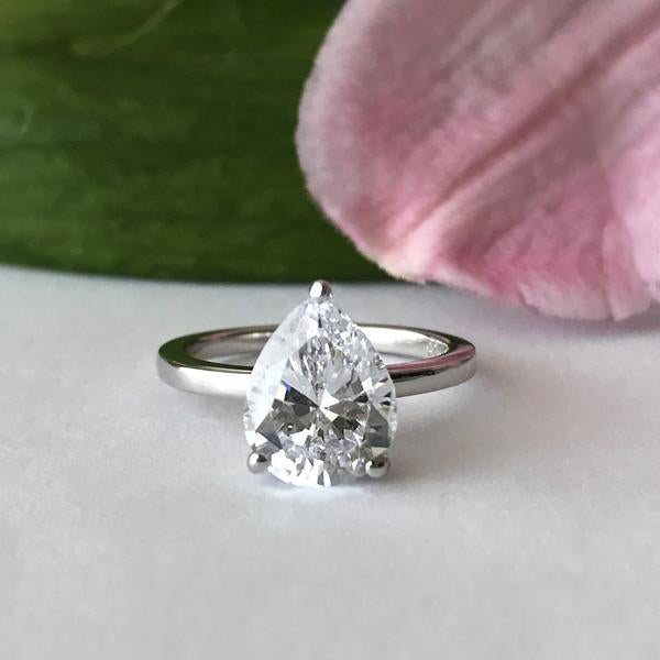 3 Carat Pear Cut Solitaire Engagement Ring in White Gold over Sterling Silver