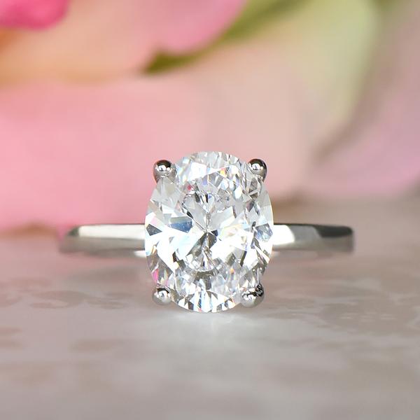 3 Carat Oval Cut Solitaire Engagement Ring in White Gold over Sterling Silver