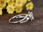 1.50 Carat Oval Cut Moissanite and Diamond Halo Engagement Ring in 9k White Gold