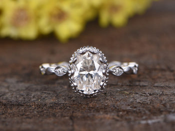 Antique 1.25 Carat Oval Cut Moissanite and Diamond Engagement Ring in 9k White Gold