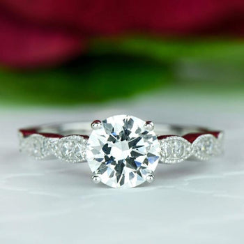 1.25 Carat Round Cut Wide Art Deco Solitaire Engagement Ring in White Gold over Sterling Silver