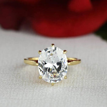 3 Carat Eight Prongs Oval Cut Solitaire Engagement Ring in Yellow Gold over Sterling Silver