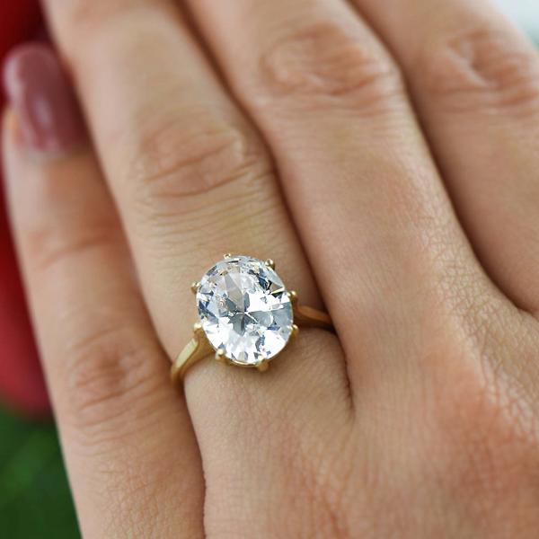 3 Carat Eight Prongs Oval Cut Solitaire Engagement Ring in Yellow Gold over Sterling Silver