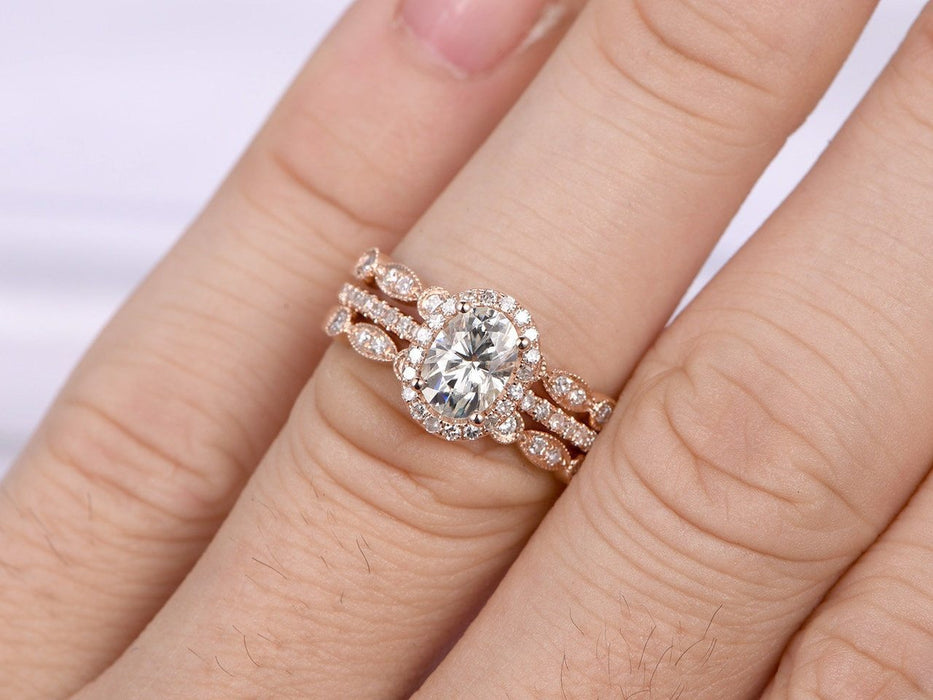 2 Carat Oval Cut Moissanite and Diamond Halo Trio Wedding Ring Set in Rose Gold