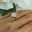 1.5 Carat Round Cut Double Halo Engagement Ring in White Gold over Sterling Silver