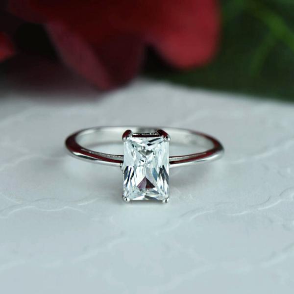 1.5 Carat Emerald Cut Solitaire Engagement Ring in White Gold over Sterling Silver