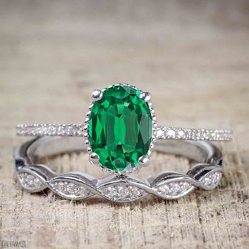 1.25 Carat Oval cut Emerald and Diamond Wedding Ring Set in White Gold