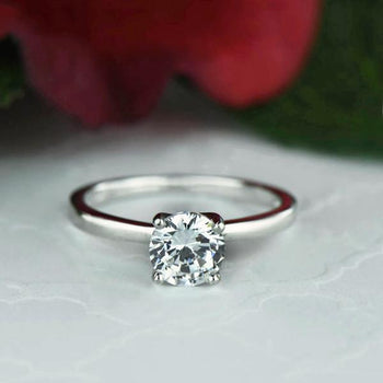 1 Carat Round Cut Solitaire Engagement Ring in White Gold over Sterling Silver