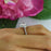 1.5 Carat Oval Cut Halo Engagement Ring in White Gold over Sterling Silver