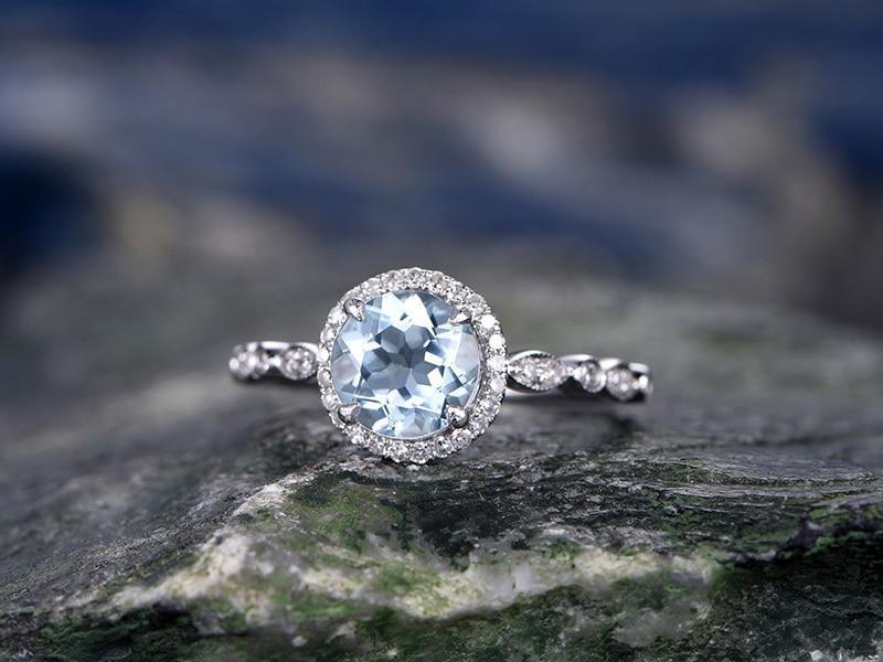1.25 Carat Round cut Aquamarine and diamond Engagement Ring in White Gold