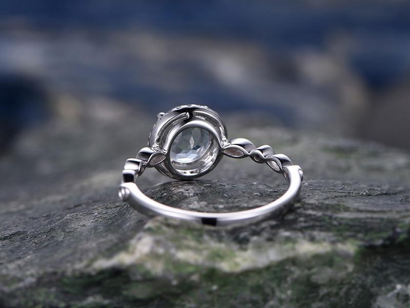 1.25 Carat Round cut Aquamarine and diamond Engagement Ring in White Gold