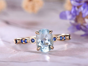 1.25 Carat Oval Cut Aquamarine and Sapphire Engagement Ring in Rose Gold