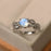 Leaf Design 1.50 Carat Round Cut Blue Moonstone and Diamond Channel Engagement Ring in White Gold