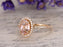 1.25 Carat Oval Cut Morganite and Diamond Halo Engagement Ring in Yellow Gold