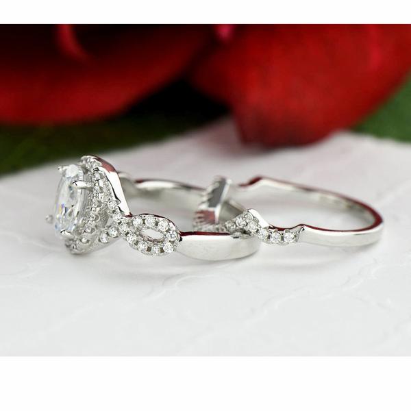 2.25 Carat Oval Cut Halo Twisted Bridal Ring Set in White Gold over Sterling Silver