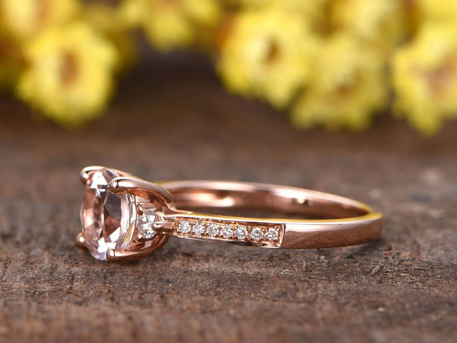 1.25 Carat Three Stone Round Cut Morganite and Diamond Trilogy Engagement Ring in Rose Gold