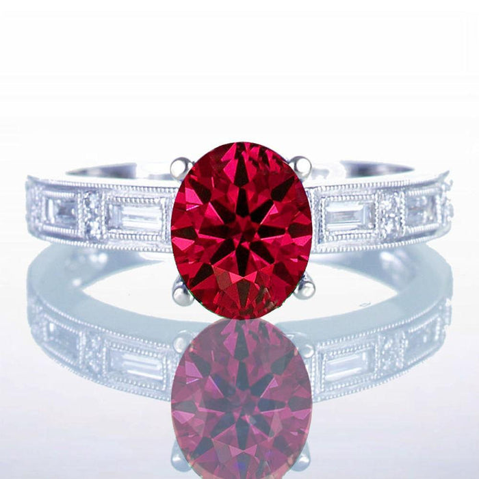 1.5 Carat Oval Cut Ruby and Baguette Diamond Milgrain Engagement Ring