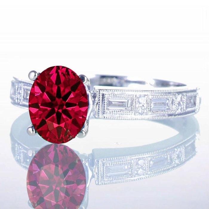 1.5 Carat Oval Cut Ruby and Baguette Diamond Milgrain Engagement Ring