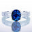 1.5 Carat Oval Cut Sapphire and Baguette Diamond Milgrain Engagement Ring