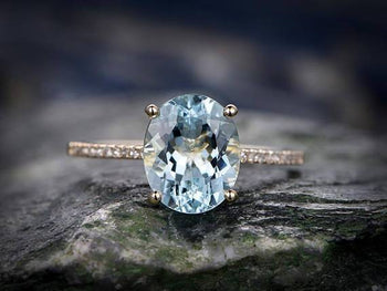 1.5 Carat Oval Cut Aquamarine and Diamond Engagement Ring in Rose Gold