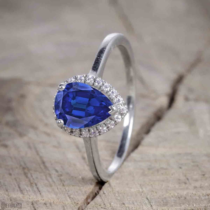 Antique Vintage 1.25 Carat Pear Cut Sapphire and Diamond Halo Engagement Ring for Women in White Gold