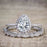 Unique 2 Carat Pear Cut Moissanite and Diamond Halo Wedding Ring Set for Her in White Gold
