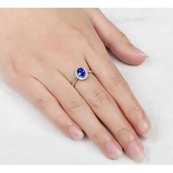 1.50 Carat Oval Cut Sapphire and Diamond Halo Engagement Ring