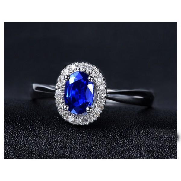 1.50 Carat Oval Cut Sapphire and Diamond Halo Engagement Ring