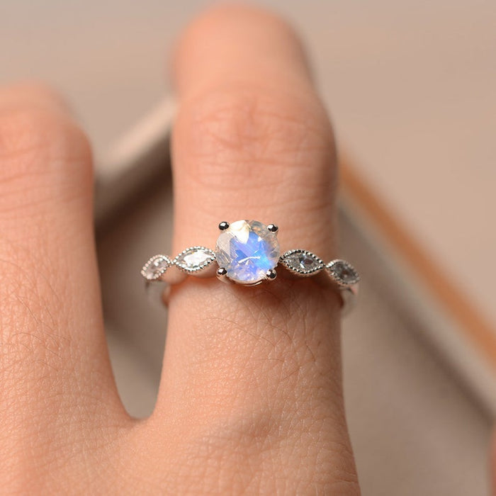 Art Deco Milgrain 1.25 Carat Round Cut Blue Moonstone and Diamond Engagement Ring in White Gold