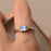 1.15 Carat Princess Cut Blue Moonstone and 6 Stone Diamond Engagement Ring in White Gold