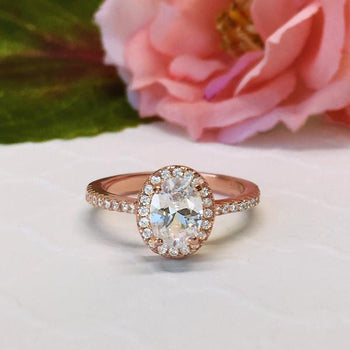 Beautiful 1.5 Carat Oval Cut Halo Engagement Ring in Rose Gold over Sterling Silver