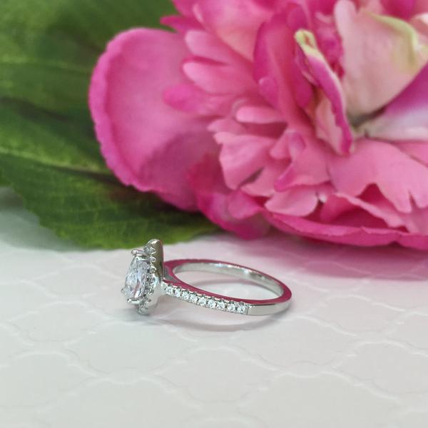 1 Carat Pear Cut Halo Engagement Ring in White Gold over Sterling Silver